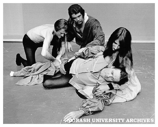 Scene from 'Othello'. Raymond Long (left) as Iago, Kit Calton (front) as Cassio, Susie Rosedale (right);