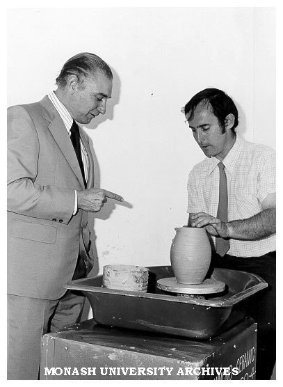 Caulfield Technical College Ceramics student Neil Turney, demonstrating at the Industrial Design Centre, Melbourne, watched by R. A. Rosenfeldt (left), Chairman Industrial Design Commission of Australia