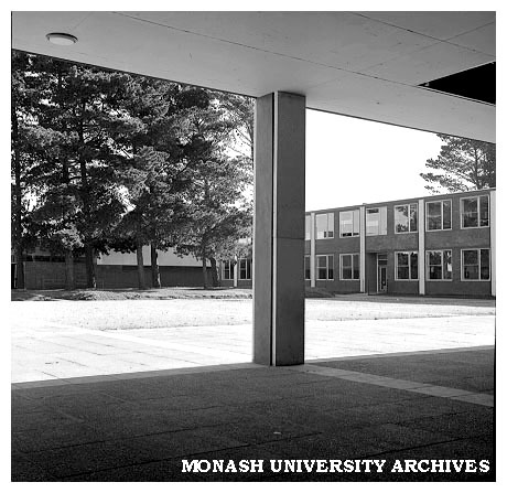 Physics building with trees in front of theatres