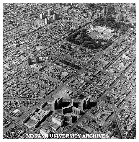 Aerial view of Carlton and Exhibition Building with high rise Housing Commission flats in forground and Melbourne CBD in top right