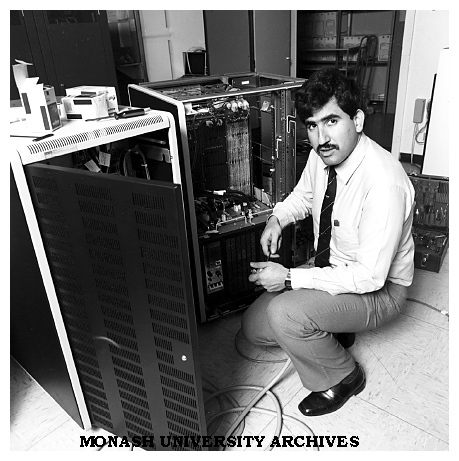 Digital field service engineer Mr Bambos Haralambous with digital VAX 11/750 central processor of the Business Technology Centre