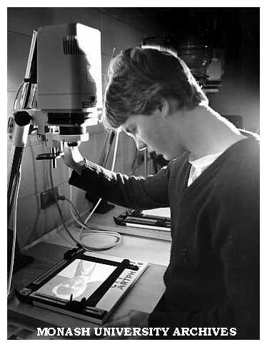 Student Jason Lewis at work in Graphic Design darkroom