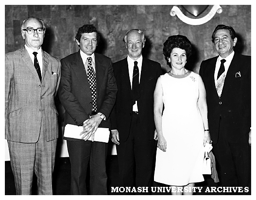 Guests at presentation of model of proposed Krongold Centre to Dinah and Henry Krongold (right)