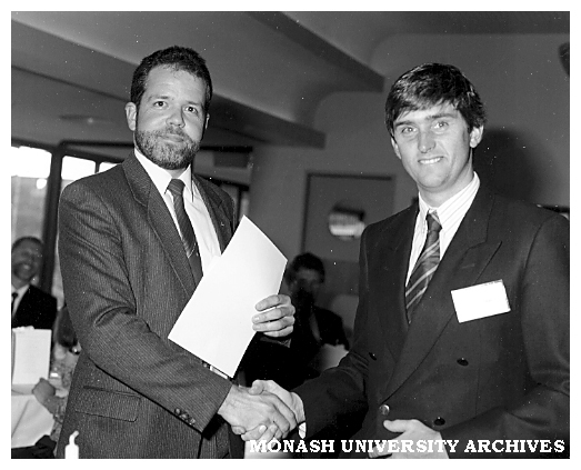 Hans de Zwart (left) receiving the Response Resource marketing award from John Dayman