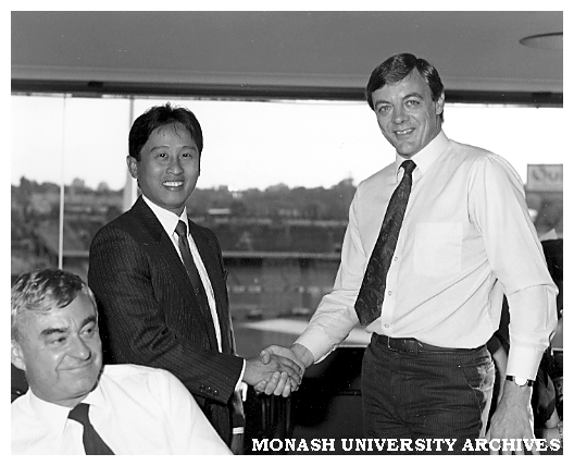 Choon Seane Lee receiving the Frank Small &amp; Assoc. Award in marketing from Kevin Sharp