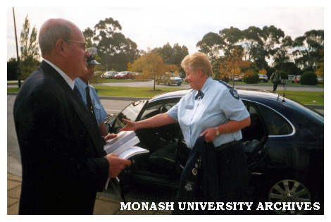 Police Chief Commissioner Ms Christine Nixon arriving at Berwick campus for lecture to public relations students, greeted by Peter Scholem (Public Relations lecturer) and Barry Cavanagh (Security Guard).