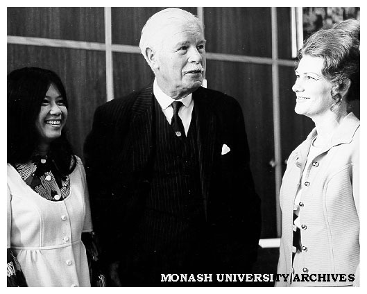 Sir Rohan Delacombe at Caulfield Institute of Technology's 50th Anniversary celebrations with Staff Officer Jenny Taylor (left) and Printing Services Manager Mrs Margaret Blank