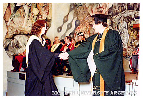Stephanie Webb receiving Bachelor of Pharmacy from Thomas Lynden-Bell, President, Victorian College of Pharmacy