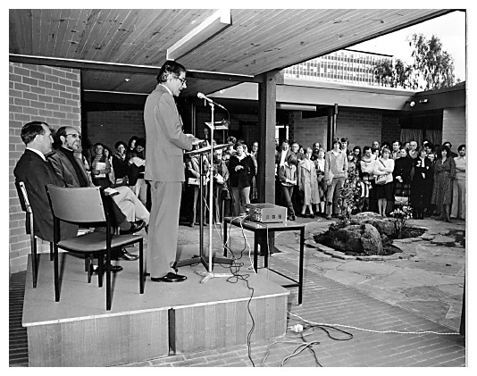 Vice-Chancellor Professor Ray Martin opening the Monash Arts and Crafts Centre. Warden of the Union Graeme Sweeney and Activities officer Graham Dean on dais.