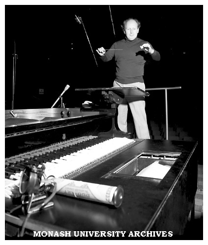 John Hopkins, Melbourne Symphony Orchestra conductor and a Duo Art Vorsetzer robot used to play and record Percy Grainger's pianola rolls with the orchestra