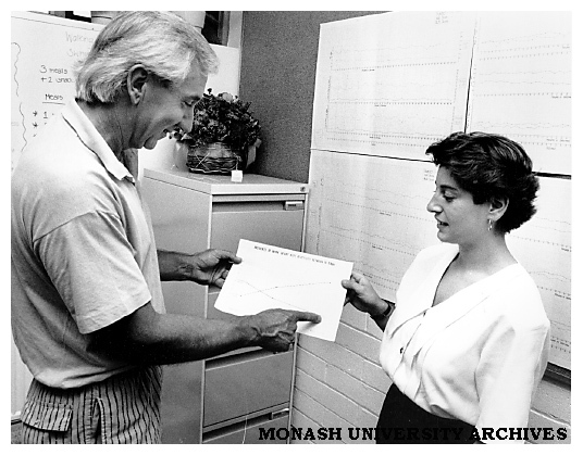 Dr Chris Sharpley (left), Stress Management and Counseling Clinic, speaks speaks to test subject.