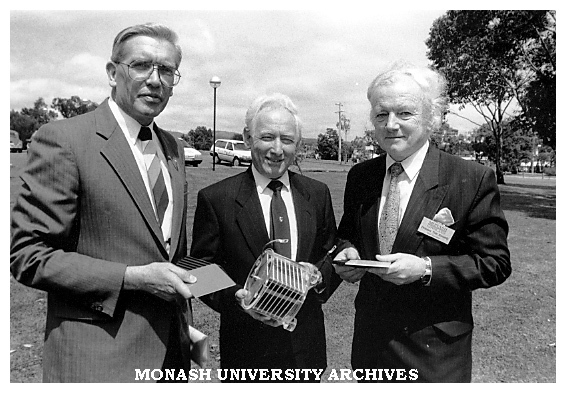 Mr George Bates (left), SEC Chief General Manager, Mr Peter Coats, CFCL Chairman and Pro VIce-Chancellor Professor Tom Kennedy hold ceramic fuel cell components