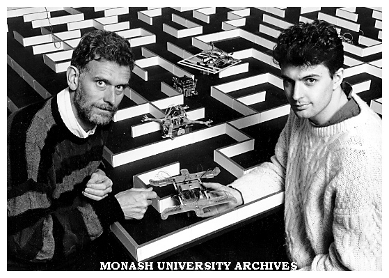 Lecturer Dr Simon Hill (left)and third year digital technology student Mr Brendan Simon with a maze and electro mechanic robotic mice