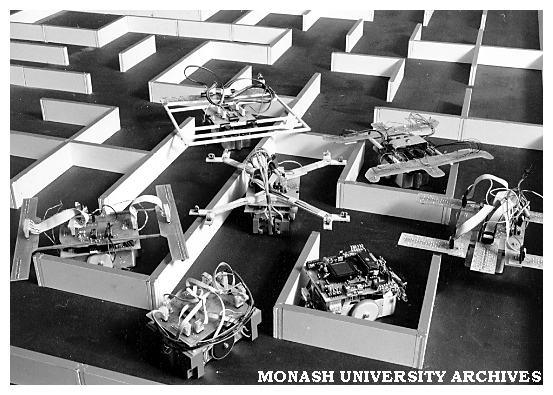 Electro-mechanical robot mice in a maze