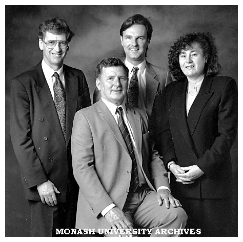 Australia's first bioethics master's graduates with course coordinator Dr Justin Oakley (centre back). Pictured (from left) Surgeon Dr David McIntosh, lawyer Mr John O'Sullivan and nurse Mrs Beverley Touzel