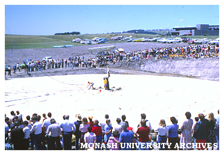 Binishell construction watched by spectators
