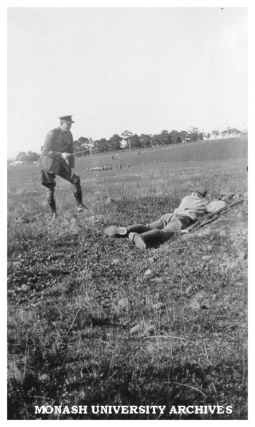 Caulfield Technical School cadet camp. W. O. Bromley instructing Sergeant Easton on 'sniping'