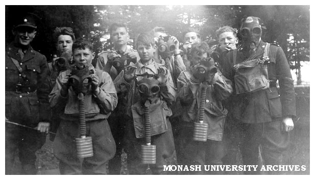 Caulfield Technical School cadet camp. Cadets during a gas respirator exercise