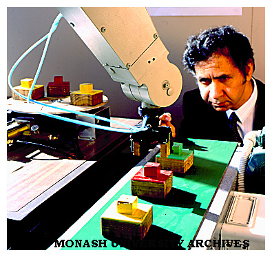 Gippsland engineering senior lecturer Ibrahim Yousef with robotic arm