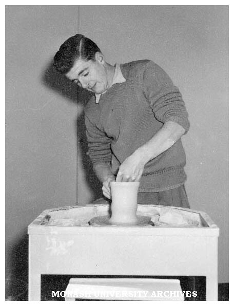 Art student at work in the Myer's window at Commonwealth Technical Training Week exhibition at Chadstone shopping centre.