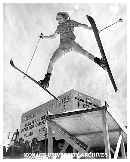 Student using ski-jump and man-made snow near Halls of Residence