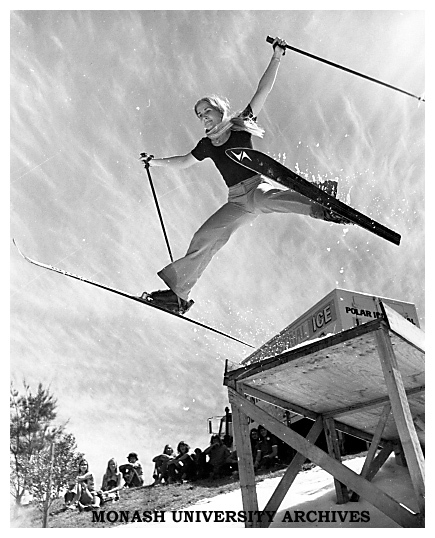 Student using ski-jump and man-made snow near Halls of Residence