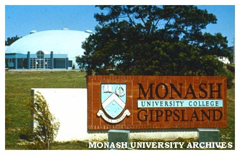 Entrance sign for Monash University College Gippsland. Binishell in background.