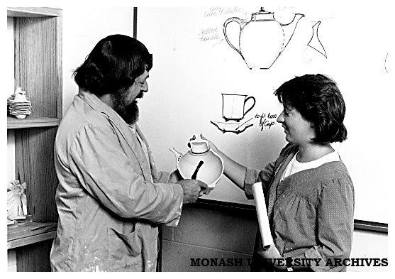 Lecturer Mr Josef Szirer and student Amanda Quinlan with samples of the Ceramic Resource Centre's technical reference material