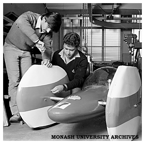 Mechanical Engineering students Mr Dominique Adrien and Mr Dennis Stathos at work on the new wheel fairings of the Chisholm 80