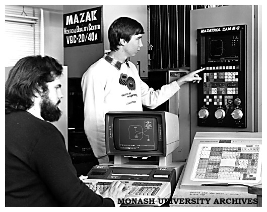 Fourth-year engineering students John Simmons (at keyboard) and Bruce Olsson demonstrate a direct link between CAD and CAM units