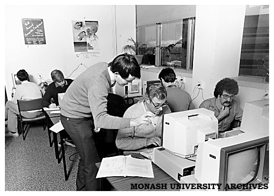 John Symington, lecturer with the Division of Information Technology, advising student on Information Modelling course for Telecom staff at Pearcy Centre