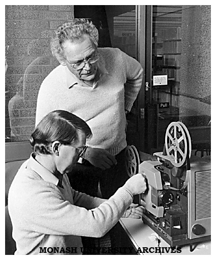Mr Nobby Clarke, of the Educational Development Unit, offering advice to Mr Bryan Baker, Accounting Lecturer and a participant in the 16mm Projectionist Course