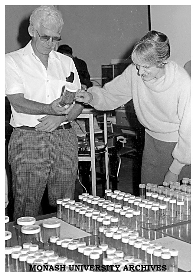 Dr Ron De Fossard checking plant tissue culture samples with a participant in his workshop on micro-propogation