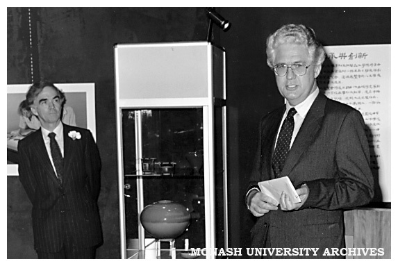 Minister for the Arts, Mr Race Matthews, speaking at the 'Continuity and Change' exhibition opening - Mr Lindsay Anderson, Head of Chisholm Ceramic Design at left