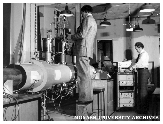 Professor Ron Brown (left) and chemistry lecturer Dr Peter Godfrey adjust apparatus designed to investigate glycine