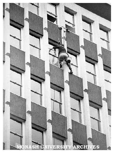 Cleaning north face of Menzies Building