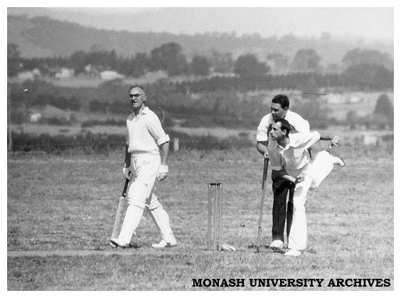 First Monash University cricket match, Vice-chancellors XI v Students XI, 28 November 1961. Vice-chancellor Dr Louis Matheson (left), Richard Harcourt (bowling), Gordon House(Umpire).