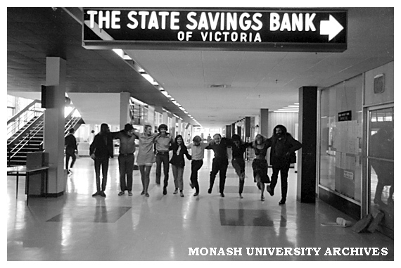 Students posing for Sate Savings Bank advertisement in the Orientation Handbook