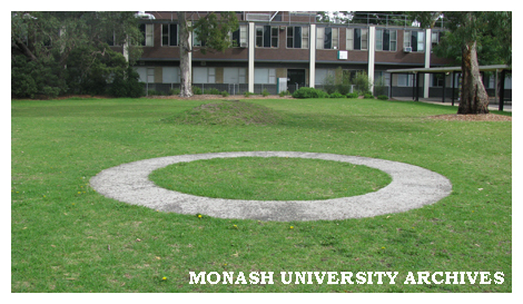 Science courtyard with Clive Murray-White sculpture 'Retrospective 1970-1993', a turf mound and concrete annulus.