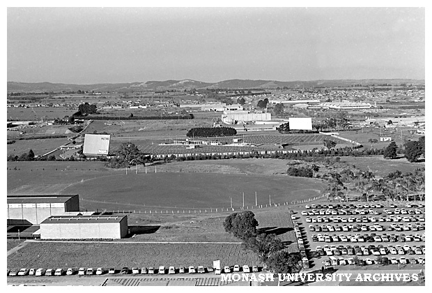 Monash Sports Centre and playing fields with drive-in in background