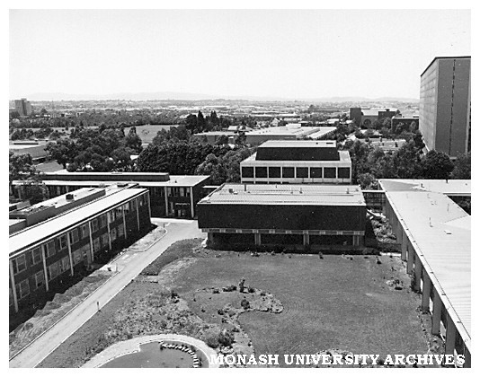 Raised view of Botany systems garden with Biochemistry laboratories and Biomedical library in foreground and Halls of Residence (left) and Menzies building (right) in the background.