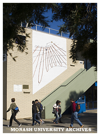 Sun dial on wall of Clayton Campus Centre