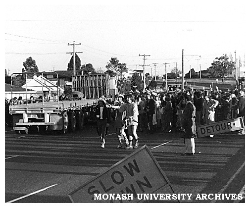 Student champagne breakfast disruption to traffic on Dandenong Rd, Clayton during Farm Week