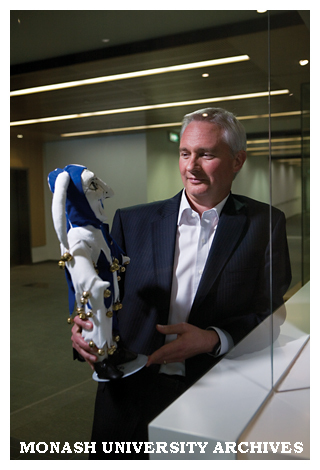 Professor Bill Charman, Dean of Pharmacy and Pharmaceutical Sciences, with keepsake from Basel, Switzerland.