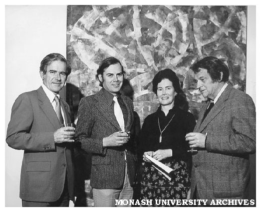 Visitors to Visual Arts exhibition. From left: Professor Ray Martin, Professor Patrick McCaughey, Mrs Martin and artist Roger Kemp in front of Kemp's work 'Aerial Rhythm' (1973)