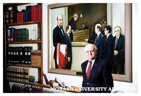 Emeritus Professor Louis Waller in front of painting by Irene Clark of the 1976 Campbell McComas impersonation of Granville Williams