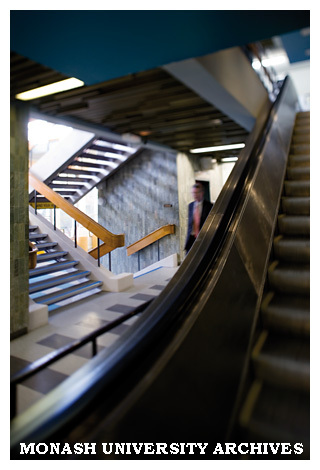 Interior of Menzies building showing escalators and stairs