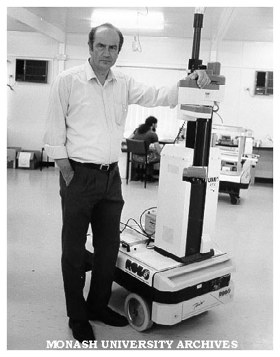 Professor Ray Jarvis, Electrical and Computer Systems Engineering with prototype robot