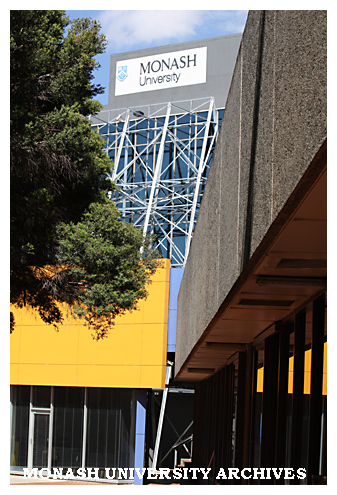 Caulfield campus courtyard with 'Silverscreen' by Callum Morton in background