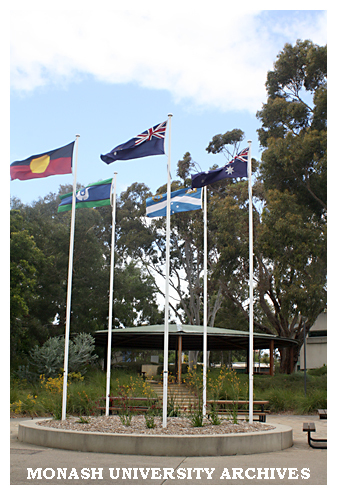 Flags at entrance to Peninsula campus